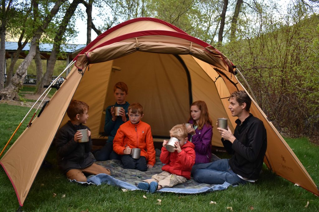 family camping mugs in a tent